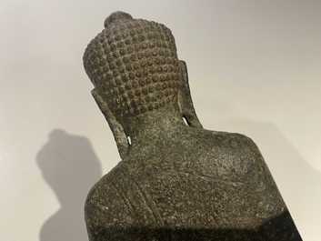 A Thai sandstone figure of Buddha, Khmer, Lopburi, 12/14th C.